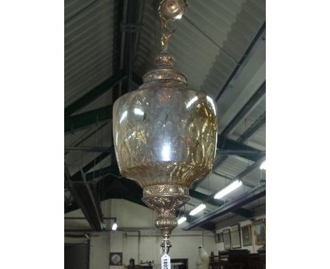 AN AMBER GLASS CEILING LIGHT, with metal mounts