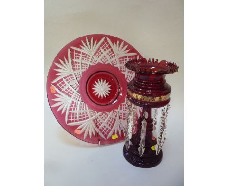 A RUBY COLOURED GLASS LUSTRE, single droplets, height approximately 32cm, and a flashed ruby coloured glass dish, diameter ap
