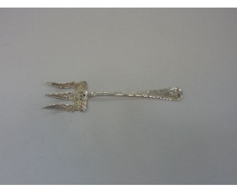 A SILVER FORK, with engraved decorative handle, hallmarks for Birmingham, makers mark Josepher Glaster, 1906