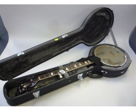 A CASED GOLD TONE FIVE STRUNG BANJO, with rosewood fingerboard and cloud inlays in mother of pearl