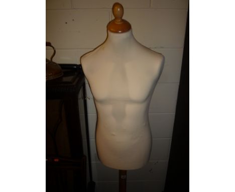 A MALE TORSO SHOP WINDOW MANNEQUIN, on tripod stand