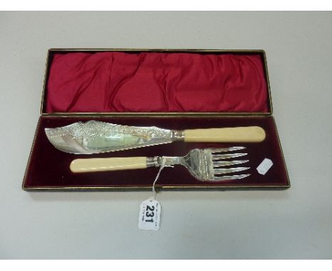 A BOXED PAIR OF SILVER COLLARD FISH KNIFE AND FORK, hallmarks for London