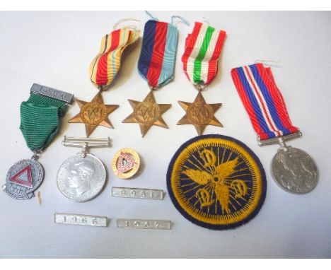 QUEEN ELIZABETH II CORONATION TIN CONTAINING A GROUP OF FIVE WWII MEDALS, 1939-45, Africa and Italy Stars, Defence and War me