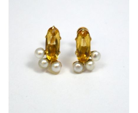 A PAIR OF CITRINE AND PEARL EARRINGS, the long oval shape citrines with three pearls to the bottom of the gemstone, stamped 1