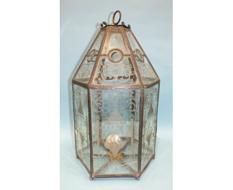 An 18th/19th century etched glass lantern of hexagonal leaded form, decorated with flowers and scroll work, 57cm high, 30cm w
