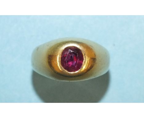 An 18ct yellow gold ring set a ruby, in rubbed-over setting, size I, 4.5g.