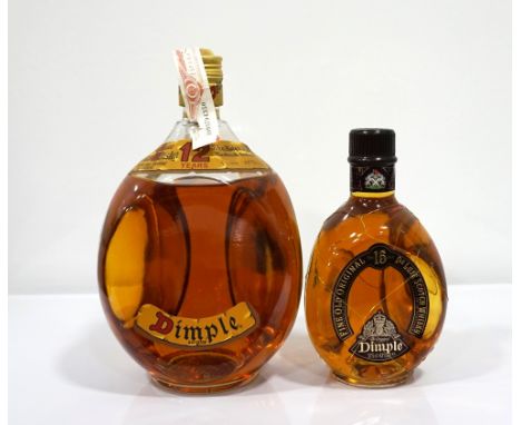 TWO BOTTLES OF HAIG'S DIMPLE
Haig's Dimple De Luxe Scotch Whisky has always been popular on the export market.  HAIG'S DIMPLE