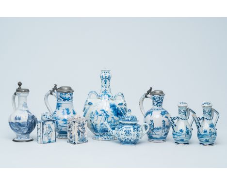 Full title: A varied collection of Dutch Delft and French blue and white pottery wares, 19th C.Description: H 30,8 - 11,9 cm 