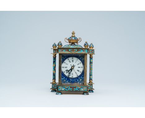 Full title: A Chinese cloisonne table clock with enamel plaques for the Persian market, 20th C.Description: H 19,1 - L 13,8 -