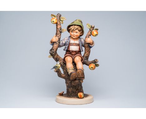 Full title: A large polychrome decorated biscuit Hummel figure, 'Apple Tree Boy', Arthur Moeller for Goebel, Germany, dated 1