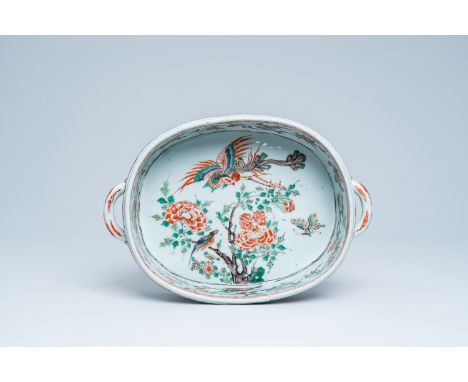 Full title: A Chinese famille verte basin with a phoenix, birds and butterflies among flowering branches, KangxiDescription: 