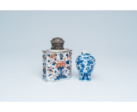 Full title: A Chinese blue and white vase and an Imari style tea caddy with floral design, KangxiDescription: H 12,7 - 8,9 cm