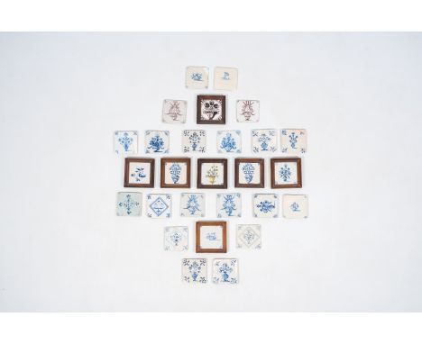 Full title: 27 blue and white and manganese Dutch Delft tiles with floral designs, 17th/19th C.Description: Each tile: ca. 13