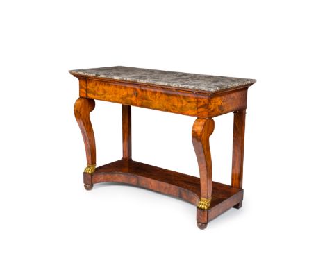 Full title: A French Louis Philippe mahogany veneered console with black gray marble top and gilt lion feet, 19th C.Descripti