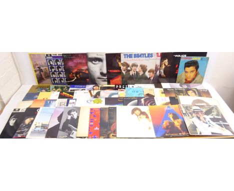 Quantity of rock and pop vinyl LPs incl The Beatles, Neil Diamond, Queen, Rolling Stones, The Police, Blondie, The Hollies, F