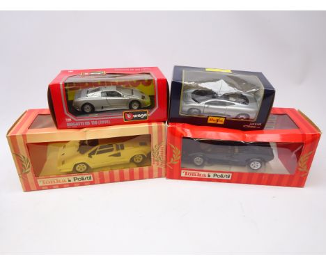 Four boxed large scale die-cast models: two Tonka Polistil Lamborghini's, Burago Bugatti EB 110 and Maisto Jaguar XJ220 (4)