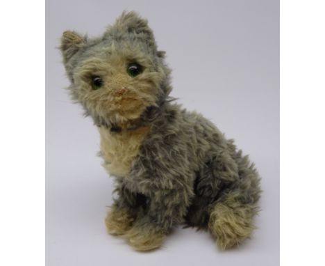 Steiff "Fluffy" cat c1920s/30s, in white and blue/grey mohair, seated with tail curled around back legs, the swivelling head 