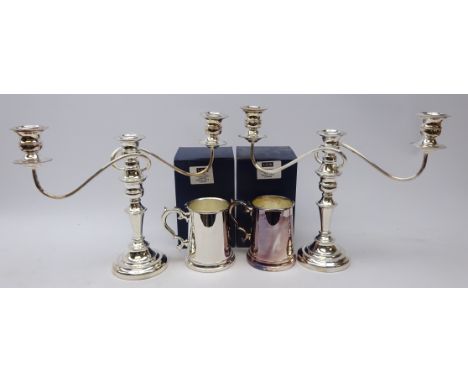Shop stock: pair silver-plated three branch candelabra and two silver-plated tankards, boxed by Laurence R. Watson & Co.  Con