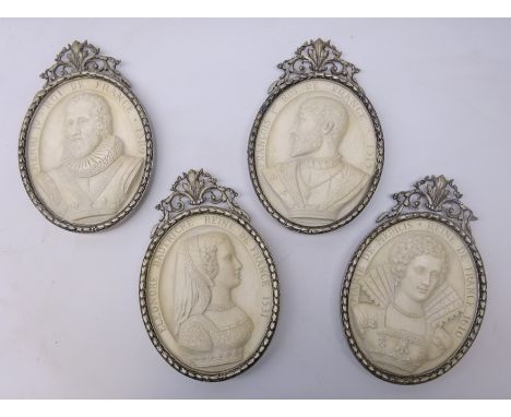 Set of four moulded plaques of oval form each with titled portrait of a French king or queen beneath a pierced scrolling pedi