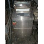 Domino model in.Solo 5 Auto in. IP65 Inkjet printer, features 18 in. wide x 16 in. deep x 34 in.