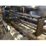 Stainless steel overcapper, mounts over existing conveyor system, dual spin rolls, adjustable and