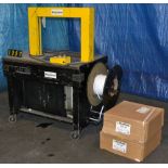 Acme Packaging model M straper, MAC number 71754, built in 1986, adjustable tension, with strap reel
