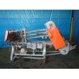 Russell roll-in case packer, model number RCP54, serial number B2-33, currently set to 404x309 cans,
