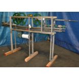 Center pull can track, adjustable from 202 to 401 can sizes, currently set to 211 can size, 9-1/2