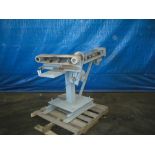 Dell roll-thru over capper, set on 401 size cans, electrically driven spinning roll magazine