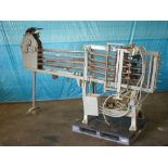Standard-Knapp roll-in caser, set up for 307 x 509 cans, 3 x 4 x 1 pattern, mechanical push,