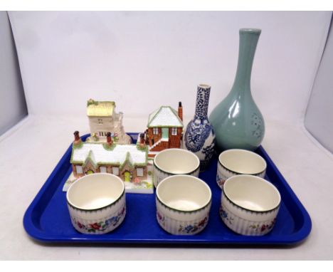 A tray containing assorted ceramics to include Copeland Spode Chinese ramekins, three Coalport house ornaments, a celadon vas