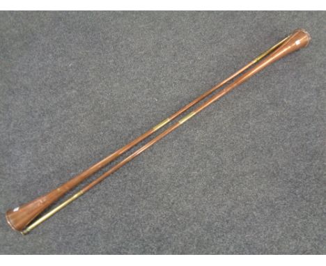 A pair of copper and brass hunting horns, length 113 cm.