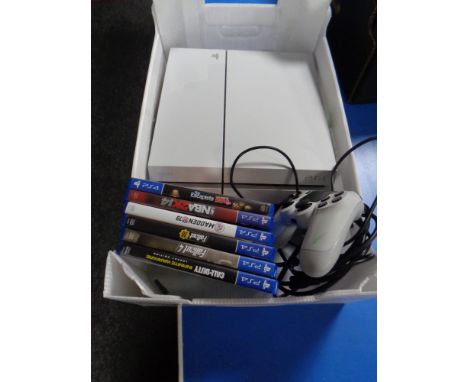 A Playstation 4 console with leads and controller together with 6 games to include Call Of Duty, NFL NBA