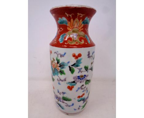 A Chinese glazed porcelain vase decorated with birds and foliage. Height 19.5 cm