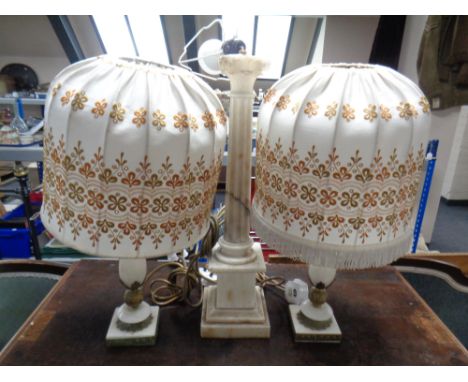 A pair of white marble and brass table lamps with shade together with a further antique Corinthian column marble table lamp