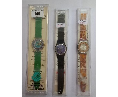 Three Swatch Watchs; Swatch 'In Our Hands Earth Summit '92' Classic Swiss Watch, A Voie Humaine Swatch Watch and A High Beam 
