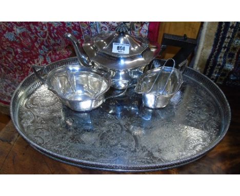 A 1920's Three Piece Imperial Silver-Plated Tea Service on an Engraved Galleried Tray.