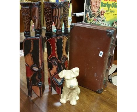 Two African Tribal Wall/Floor-Standing Masks, together with a vintage case & a large Sylvac puppy (3).