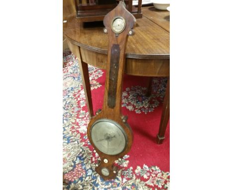 A 19th Century Mahogany Banjo Barometer; with 8' silvered dial, the level inscribed 'Casey Sheerness', 95.5cm high.