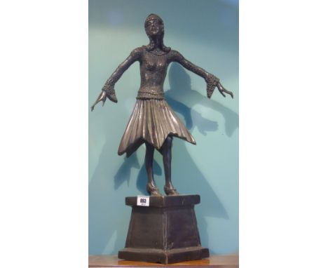 A Bronze Study in the French Manner Depicting a Standing Female Figure; in 1920s dress, of stylised proportions raised on a s