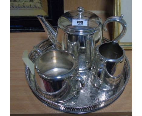 A 1950's Hotel Quality Three-Piece Tea Service on a Round Engraved Salver.