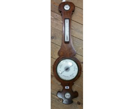 A 19th Century Mahogany Cased Wheel Barometer; with enamel dial.