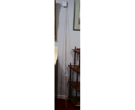 A Vintage Split Cane Three-Piece Fishing Rod.