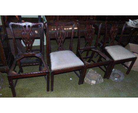 A Set of Four Chippendale Style Chairs.
