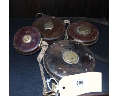 Four Vintage Measuring Tapes.