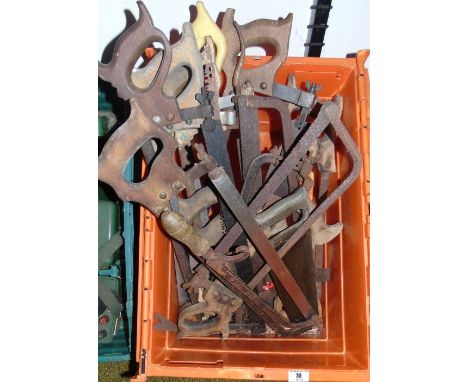 A Large Quantity of Vintage Hand Saws.