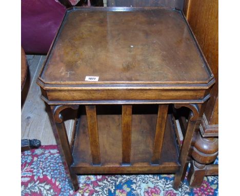 A Low 20th Century Side Table; with a tray top and a lower tier shelf, H 22" W 21" D 19".