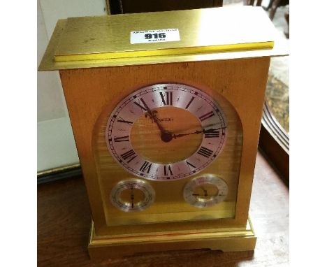 A Vintage Swiss Brass Cased Angelus Combination Clock with barometer and thermometer.