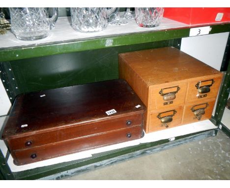 A c1930 two drawer cabinet from a Grimsby drapers shop plus assorted related ephemera and a vintage 4 drawer library and inde