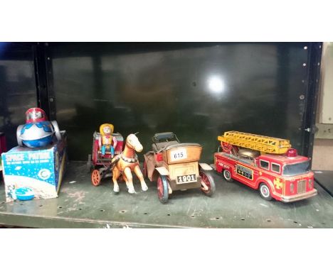 4 tinplate toys inc. stage coach, space ship and fire engine